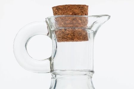 glass jar and cork on a white backgroundの写真素材