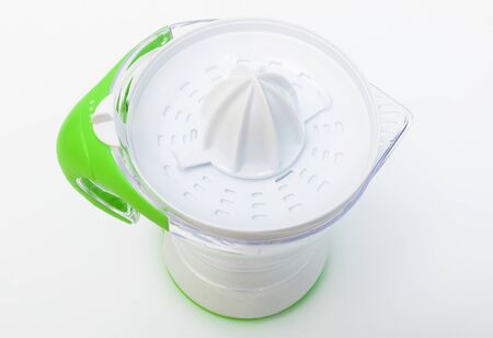 Modern juicer on a white background