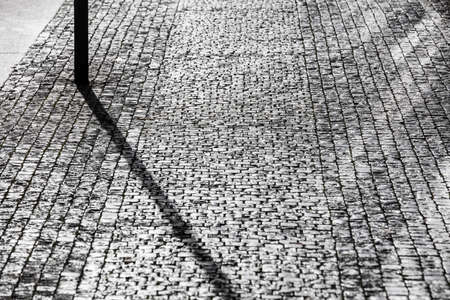 cobblestone pavement on a sunny dayの写真素材