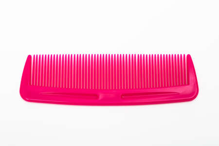 new red comb on a white background