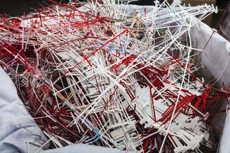 waste paper, scraps of printed materials in a modern printing houseの写真素材
