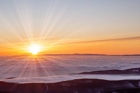 view to sunrise with inversion from the higest mountain of Czech Republic- Snezka.
