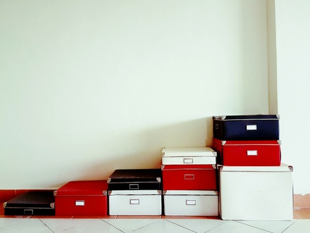 Different sizes of handy colorful paper storage boxes for easy organization of home and officesの写真素材