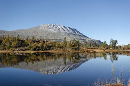 Gaustadtoppen mountains mirror lake in autumnの写真素材