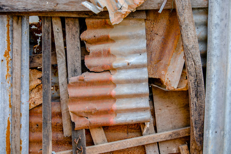 Old and rusty damaged galvanized iron plate.の写真素材