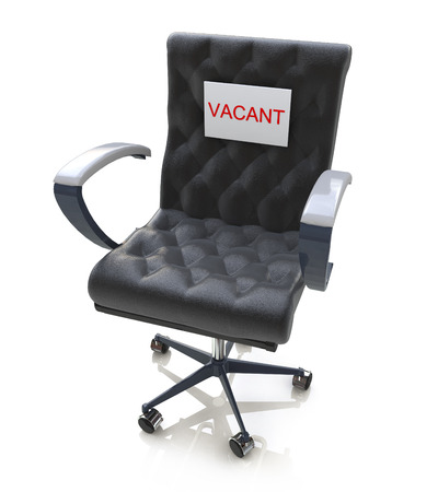 Office Chair With A Vacant Sign At Work Place in the design of information related to businessの写真素材