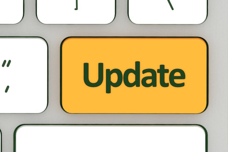 Computer notebook keyboard with Update key - technology backgroundの写真素材