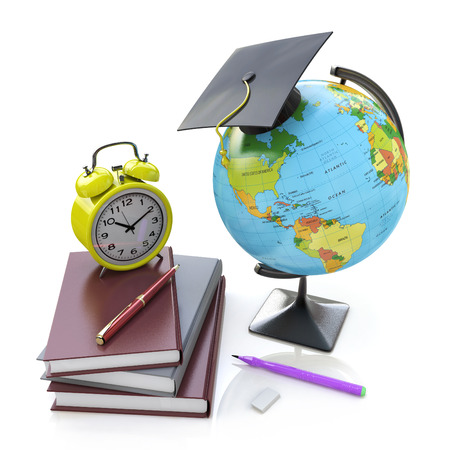 Globe, stack of school books with alarm clock and ball pens. Schoolchild and student studies accessories. Back to school concept in the design of information related to educationの写真素材
