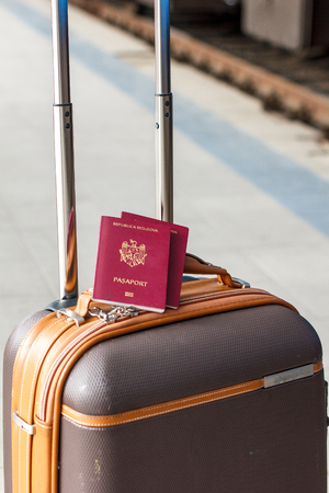 Red Moldavian biometric passport id to travel the Europe without visas. Modern passport with electronic chip let Moldavians travel to European Union without visaの写真素材