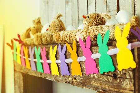 Colorful easter garland. Rabbits backgroundの写真素材