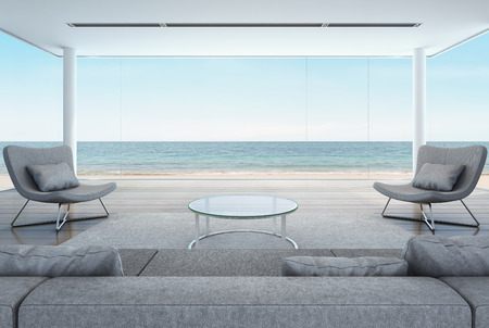 living room in beach house, modern interior with sea view - 3D renderingの写真素材