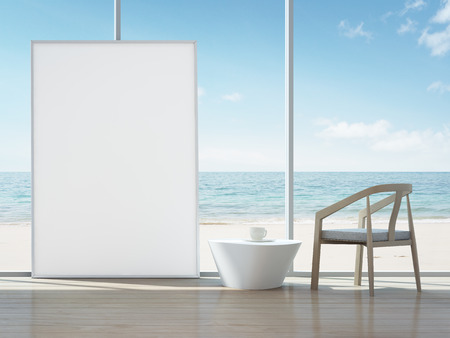 White picture frame in sea view interior of modern home - 3d renderingの写真素材