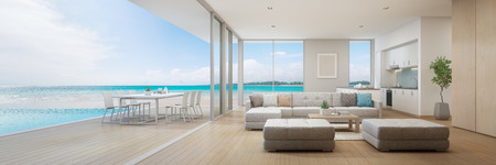 Sea view kitchen, dining and living room of luxury beach house with terrace near swimming pool in...