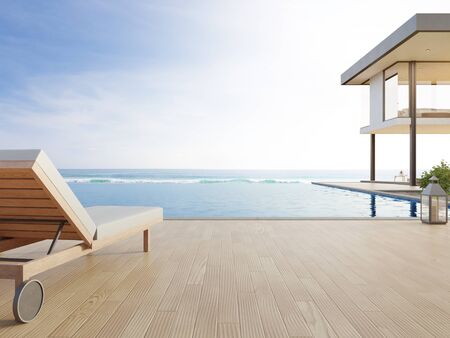 Luxury beach house with sea view swimming pool and terrace in modern design. Lounge chair on wooden...