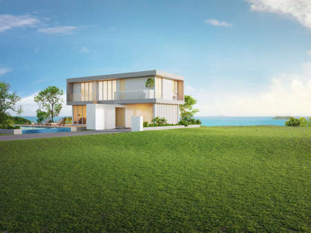 Luxury beach house with sea view swimming pool and big garden in modern design. Empty green grass lawn at vacation home. 3d illustration of contemporary holiday villa exterior.の写真素材