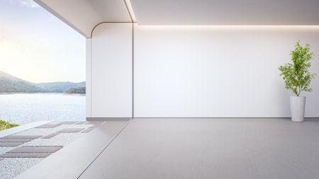 Lake view empty large living room of luxury summer house with terrace. Concrete floor and white wall in vacation home or holiday villa. Hotel interior 3d illustration.の写真素材