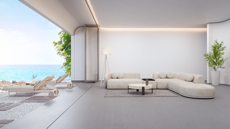 Sea view large living room of luxury summer beach house with terrace. Concrete floor and white wall in vacation home or holiday villa. Hotel interior 3d illustration.の写真素材