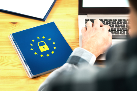 GDPR (General Data Protection Regulation) concept. Business man typing an email with laptop....