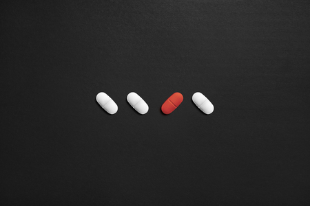 One different pill. Unique or individual. Mental health care, loneliness or malpractice. Wrong or...