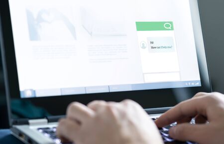 Chatbot or live chat with customer help assistant on business website. AI technology and...