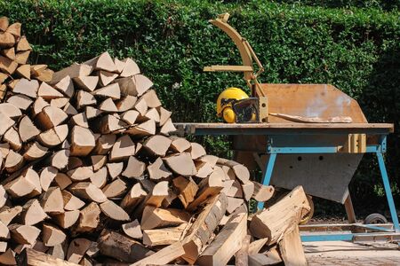 Buzz saw with firewoodの写真素材