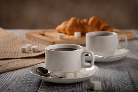 Black coffee and croissants.の写真素材