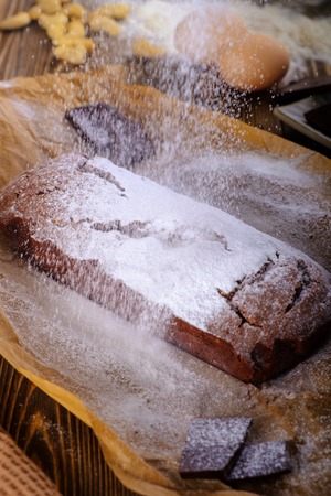 Cooking process. Fresh brownie from the oven.の写真素材