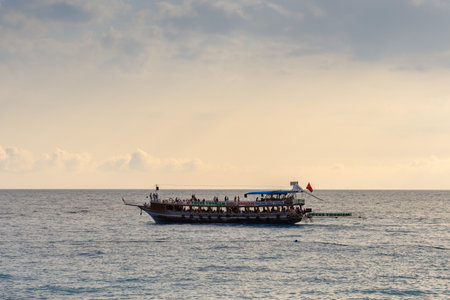 Oludeniz, Turkey - July 17, 2019. Pirate ship sailing in the Mediterranean. People rest on the ship.のeditorial素材