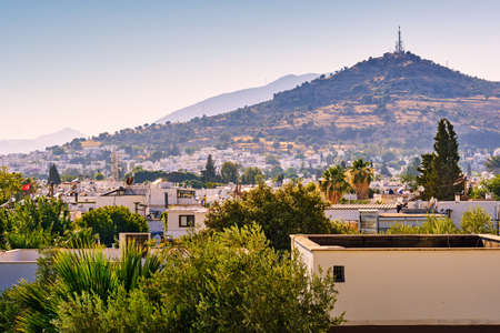 View of a city with white houses and mountains in Bodrum, Turkey.の写真素材