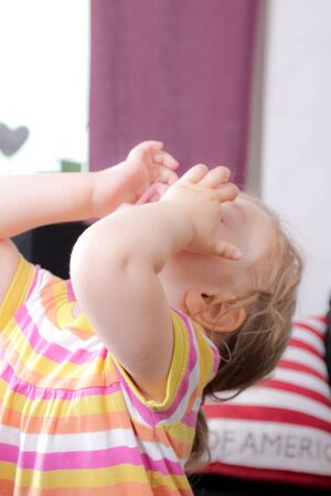 Young girl wawningの写真素材