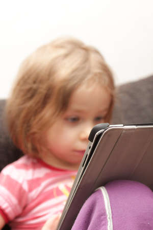 Girl with tabletの写真素材