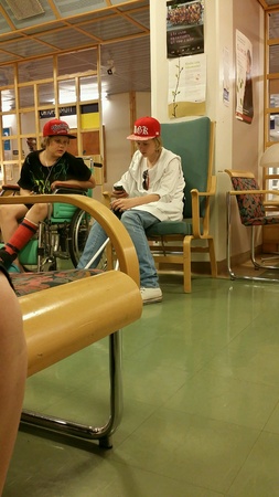 Boys in a hospital waiting roomの素材