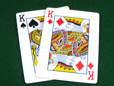 Pair of kings on green card tableのeditorial素材