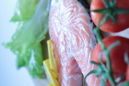 healty food salmon on cutting boardの写真素材