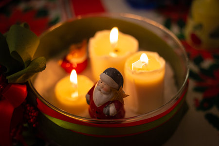 Christmas candles with Santa Clausの写真素材