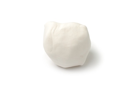 An image of a piece of white plasticine on white backgroundの写真素材