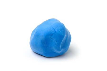 An image of a piece of blue plasticine on white backgroundの写真素材