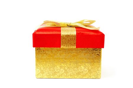 An image of golden gift box on whiteの写真素材
