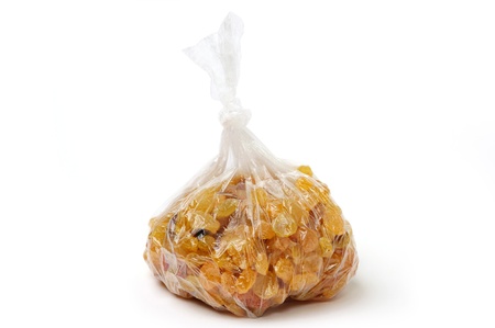 An image of tasty raisins in a clear bagの写真素材