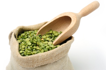 An image of dried green peas in a bagの写真素材