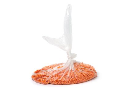An image of lentils in a transparent bagの写真素材