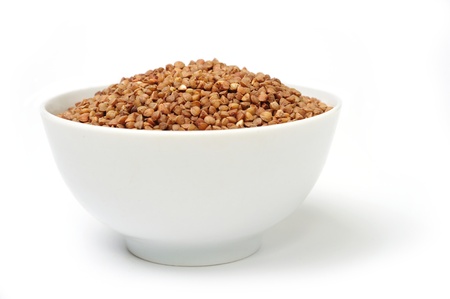An image of a bowl of raw buckwheatの写真素材