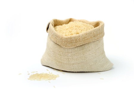 An image of raw rice in a textile sackの写真素材