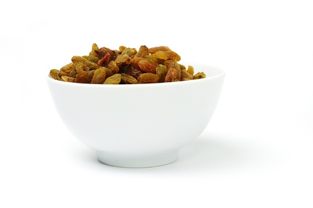 An image of a bowl with brown raisinsの写真素材