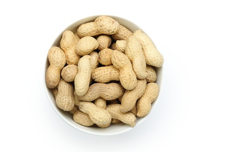 An image of shelled peanuts in a bowl
