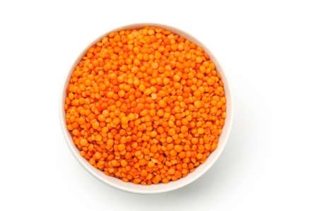 An image of a bowl with orange lentilsの写真素材