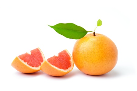 fresh grapefruit with leaves on white backgroundの写真素材