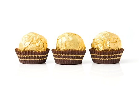 An image of candies  in golden wrappingの写真素材