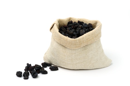 An image of dry raisins in a textile sackの写真素材