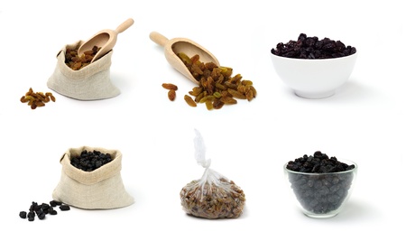 An images of dry raisins in a textile sacks and cupsの写真素材